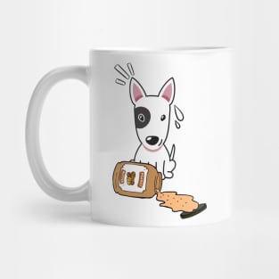 Cute Bull Terrier spilled a jar of peanut butter Mug